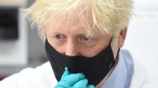  Boris Johnson during a visit to a lab at The National Institute for Biological Standards