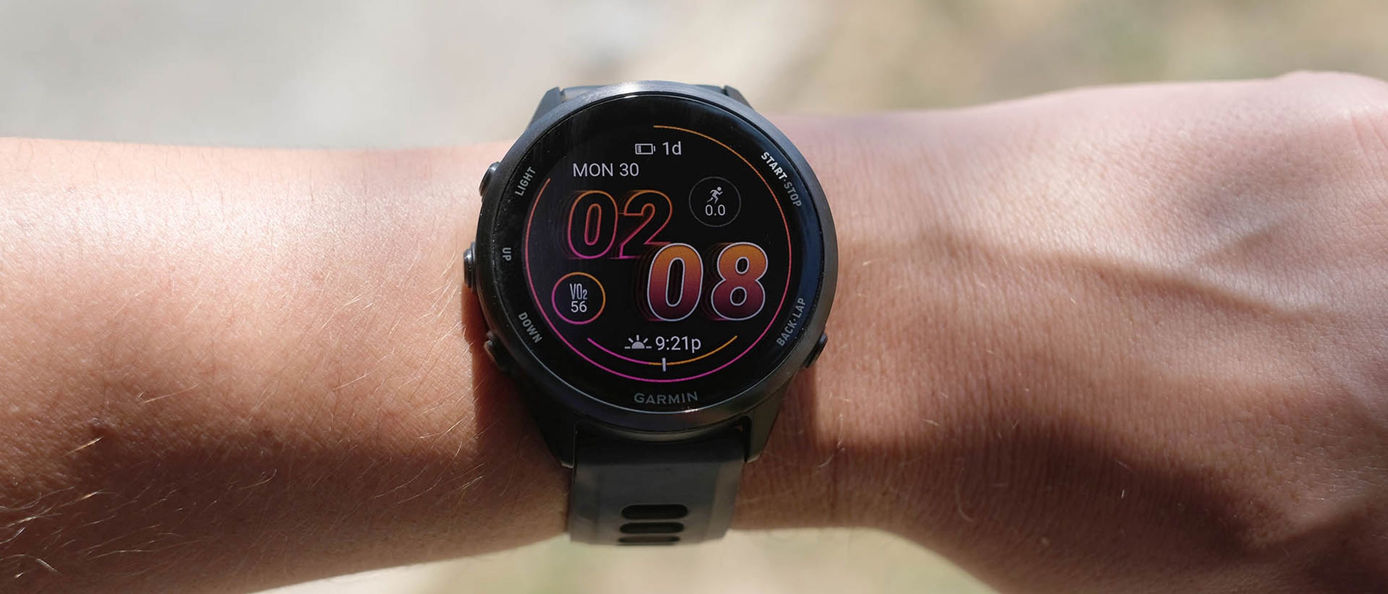 A close-up picture of our reviewer wearing the Garmin Forerunner 570