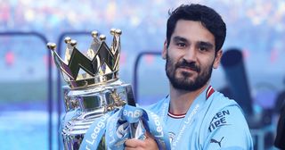 Ilkay Gundogan of Manchester City lifts the Premier League trophy after the Premier League match between Manchester City and Chelsea FC at Etihad Stadium on May 21, 2023 in Manchester, England.