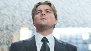 Leonardo DiCaprio stands in a collapsing dream in Inception