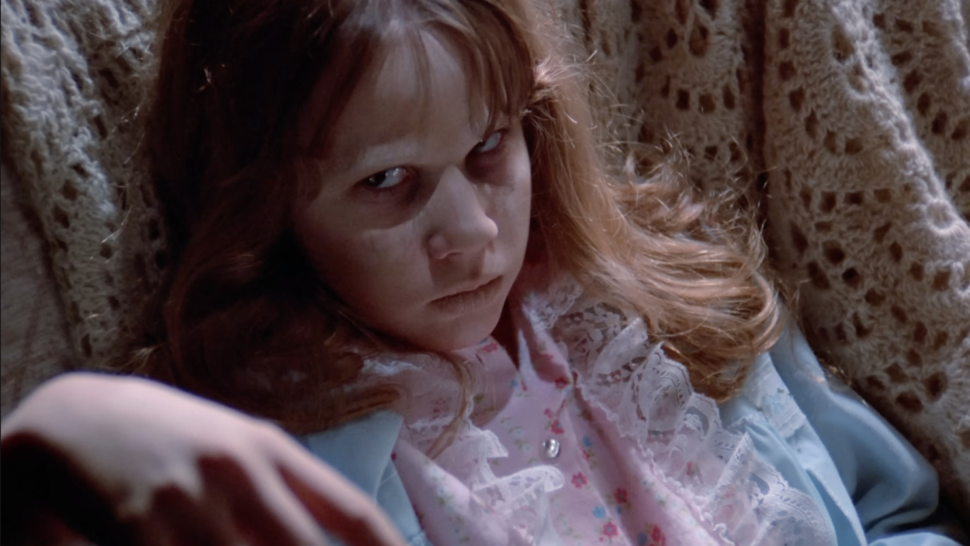 Linda Blair as Regan MacNeil possessed by the Devil in The Exorcist.