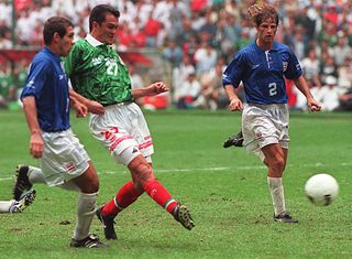 Carlos Hermosillo scores for Mexico against Costa Rica in a World Cup qualifying match in November 1997.