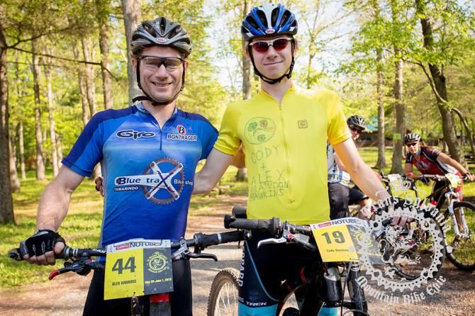 Alex Hawkins and Cody Hawkins, father and son, pose near the start.