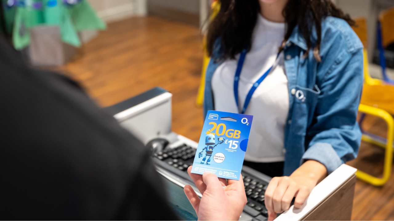 woman buying sim card