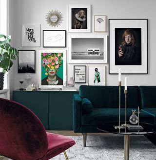 Wall gallery with different frames and green velvet couch
