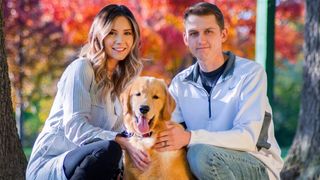 Golden Retriever dad Tucker with his pet parents