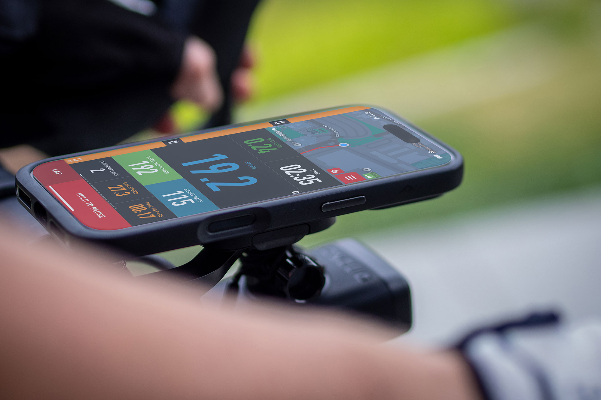 Cadence bike computer app during ride, pictured three-quarters on from the side