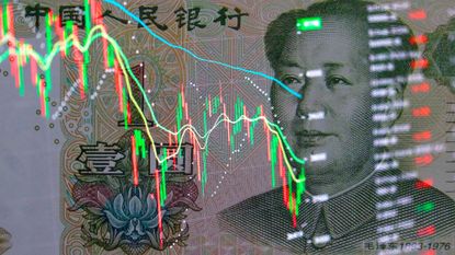 Yuan banknote with stock charts drawn on top of it, representing China&#039;s economy