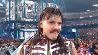 Dominik Mysterio walks down the entrance ramp at WrestleMania.