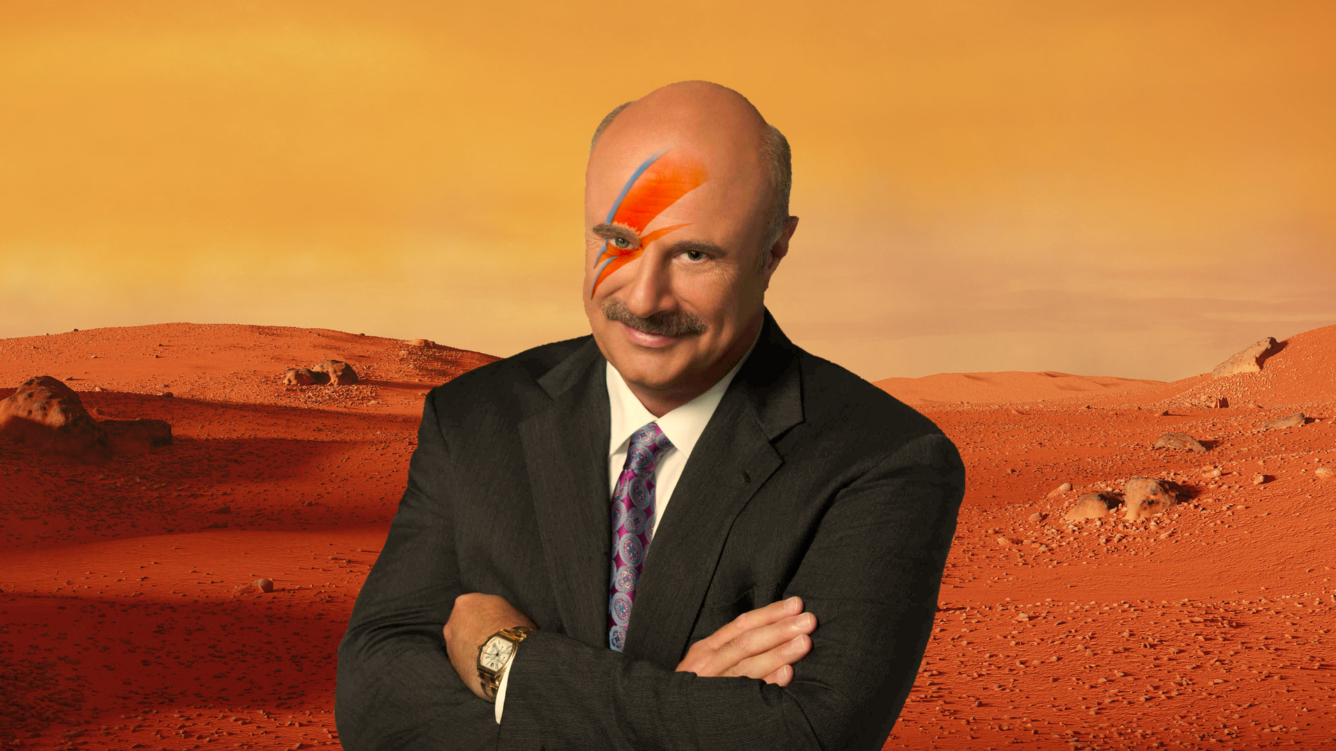 TV personality Dr. Phil on a Martian landscape wearing make-up similar to David Bowie's Ziggy Stardust.