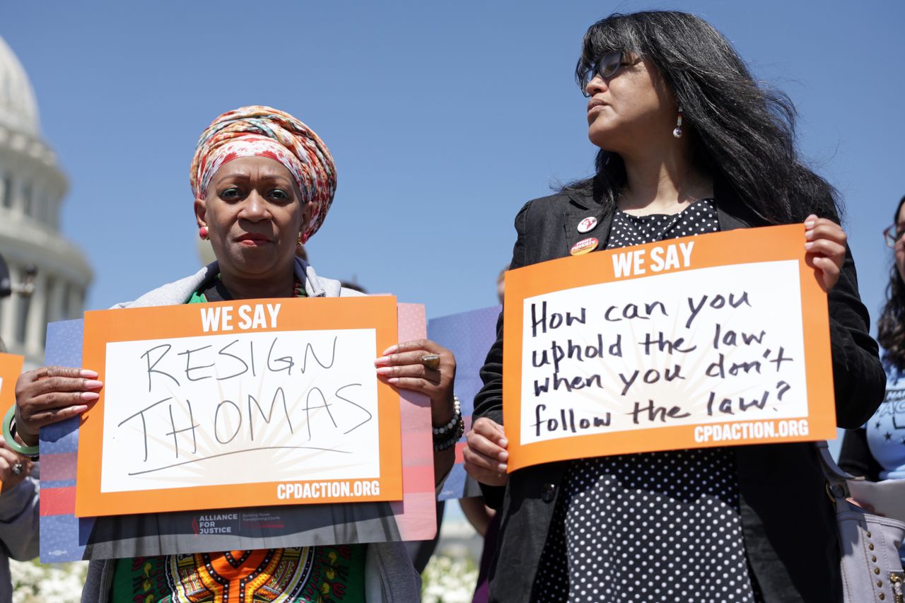 activists protest outside capitol building 