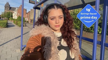 Kaycee Hill wearing Sennheiser Momentum 4 headphones