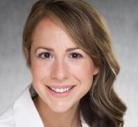 Woman smiles at camera