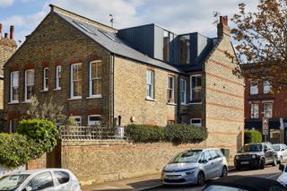 A loft conversion and a design featuring plenty of plywood has turned Lucy and Jack Williamson's flat into quirky family home