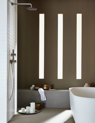 Spa bathroom with vertical lighting designed by Day True