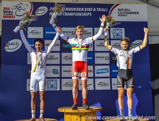 Junior men's podium at the cross country Worlds: Egan Bernal (Colombia), Simon Andreassen (Denmark), Luca Schwarzbauer (Germany)