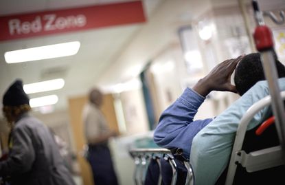 A patient waiting in the Grady Memorial Hospital, Atlanta.