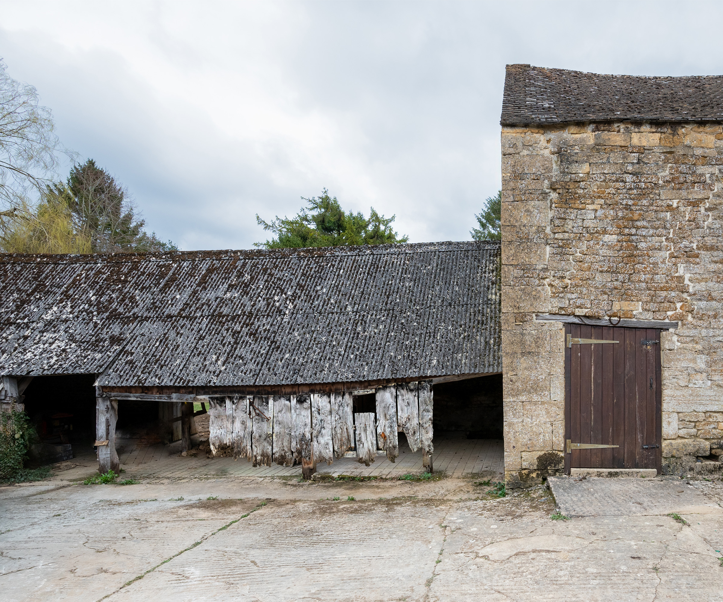 A derelict barn building before a conversion project