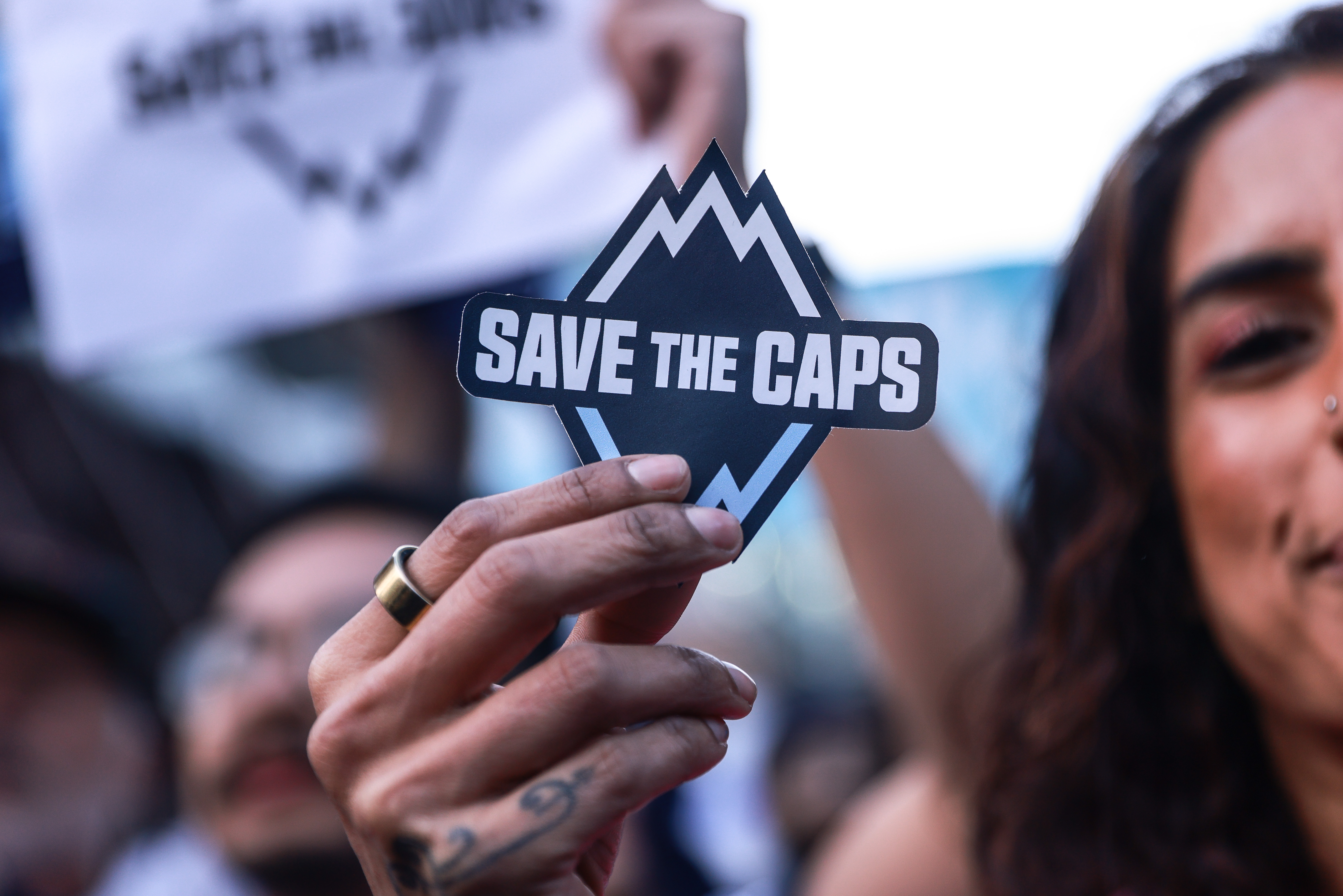 Vancouver Whitecaps protest against the potential relocation of their club on the street and in the stadium as part of the Save The Caps movement