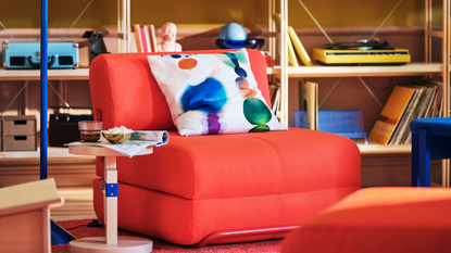 IKEA PS Collection chair bed in red and flexible lamp in blue