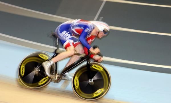 Ed Clancy (Great Britain) powers round the track to win round one of the men's omnium - 200m time trial