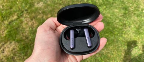 Earfun Air S earbuds and case on grassy background