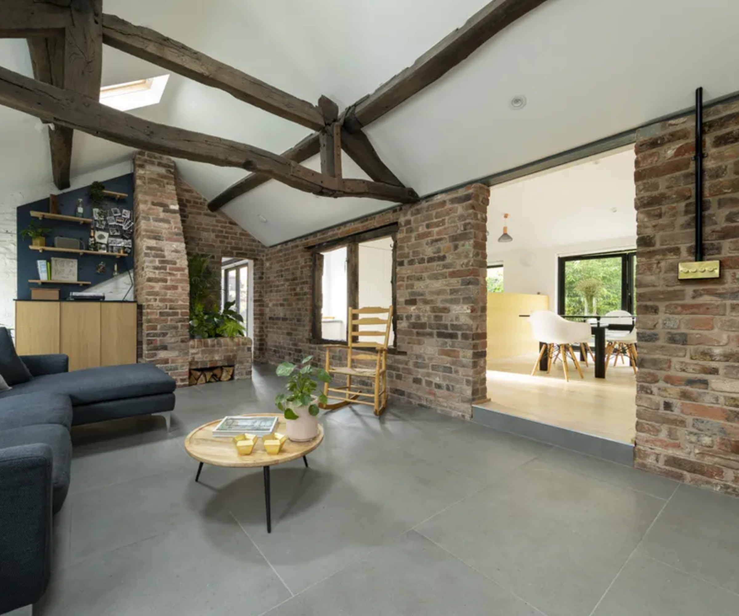 barn conversion with exposed beams and subtle lighting