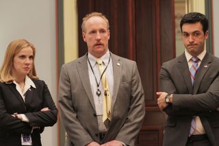 amy mike and dan look upset in their office in a still from Veep