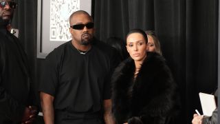 Bianca and Kanye at the Grammys before she took off her coat