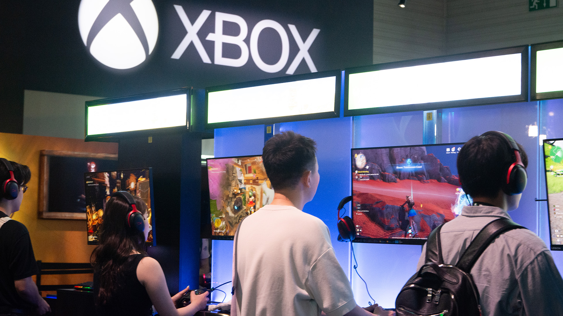 Xbox booth at Gamescom 2025 &ndash; attendees playing different games