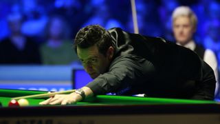 Ronnie O'Sullivan playing against Neil Robertson at Tour Championship snooker