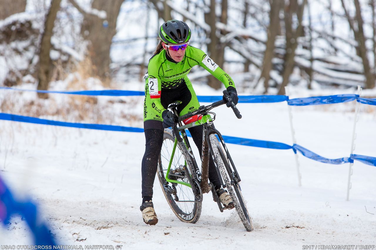 Quick reflexes save Kaitlin Antonneau on the slippery turn into the woods.