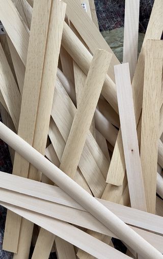 Lots of wooden dowel strips