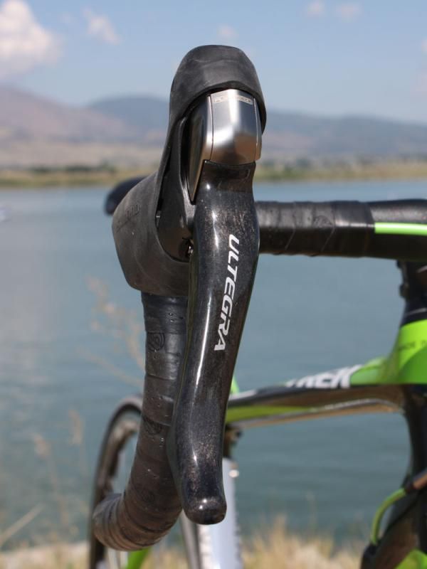 The outward cant on the lever makes for a slightly easier reach from the hoods.