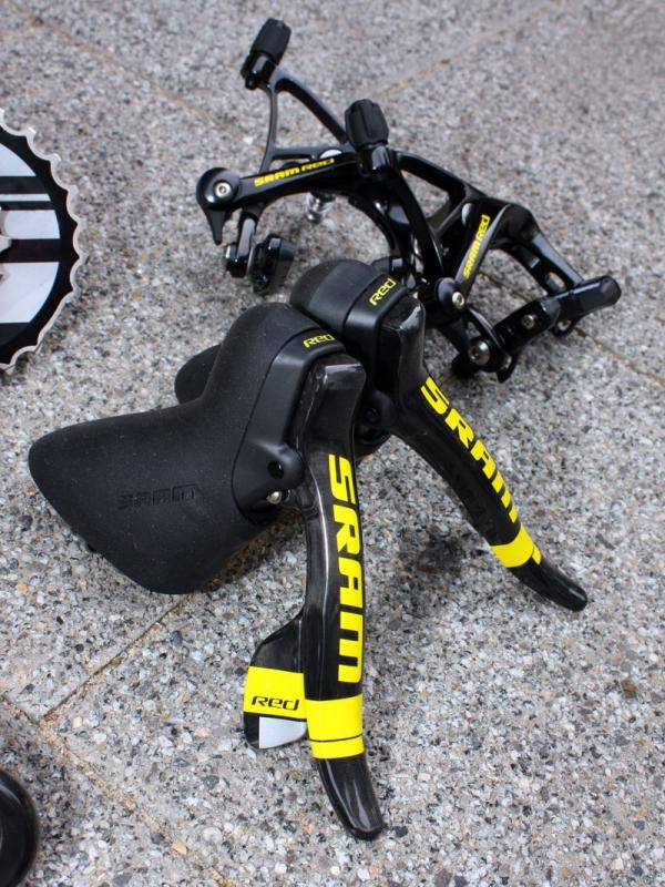The levers remain carbon fibre but the 'SRAM' logo is now yellow and enlarged on the blades.