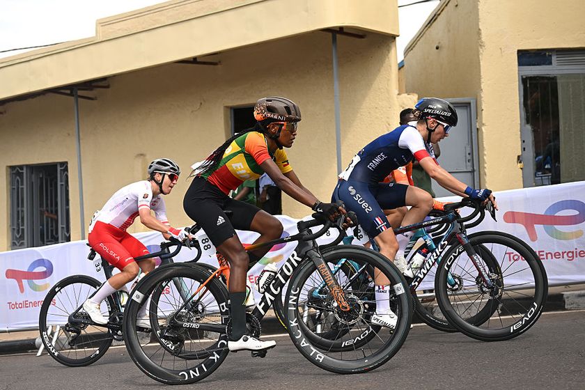 KIGALI, RWANDA - SEPTEMBER 27: (L-R) Serkalen Taye Watango and Team Ethiopia and Marie Le Net and Team France compete during the 98th UCI Cycling World Championships Kigali 2025 - Women Elite Road Race a 164.6km race from Kigali to Kigali on September 27, 2025 in Kigali, Rwanda. (Photo by Dario Belingheri/Getty Images)