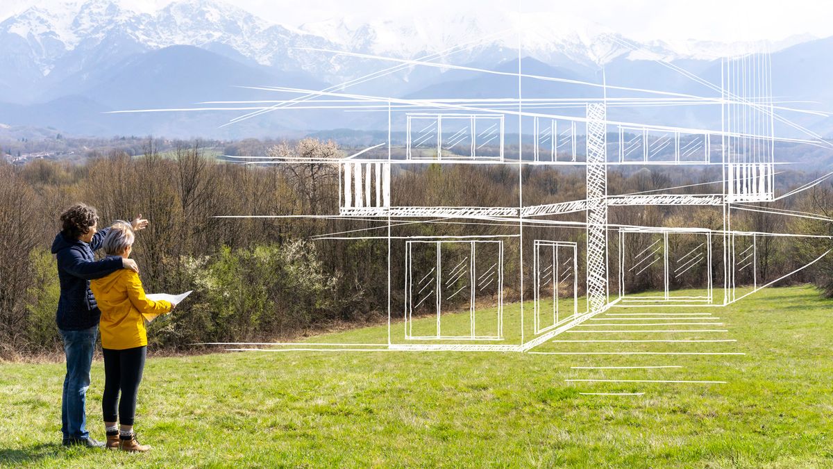 couple standing on building plot 