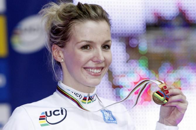 Great Britain's Rebecca James smiles on the podium following her keirin victory