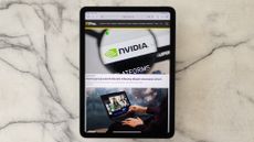 A photograph of the Apple iPad Air on a marbled table