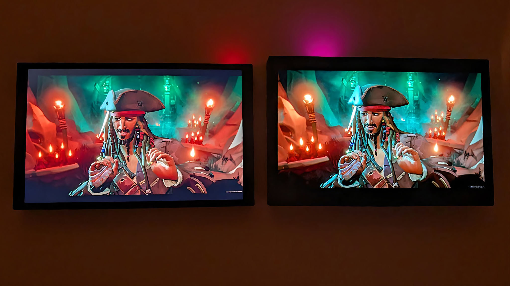 An image of the Lenovo Legion Go 2 and original Legion Go screens displaying the same image from Sea of Thieves. The OLED screen offers better color accuracy and true black contrast.