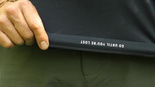 Close up photo of motivational message inside the hem ‘Go until you’re lost’