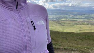 Close up of The North Face Logo on a purple fleece