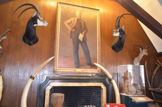 Above the fireplace is a portrait of member Peter Freuchen