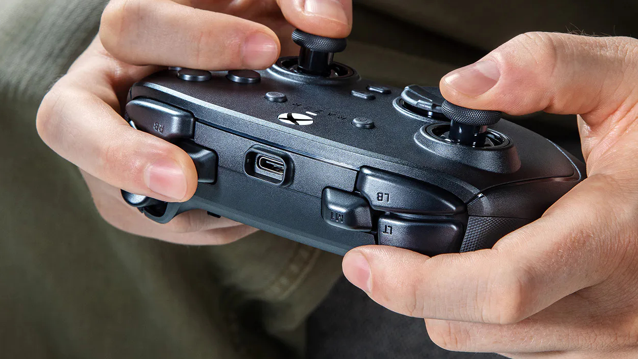 The Razer Wolverine V4 Pro controller in a man's hands