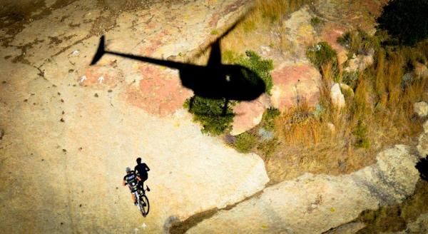 Charles Keey grinds up the slick rock mountain