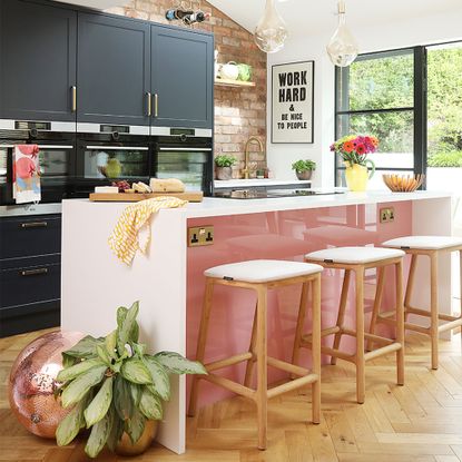 kitchen diner with island unit and bar stools