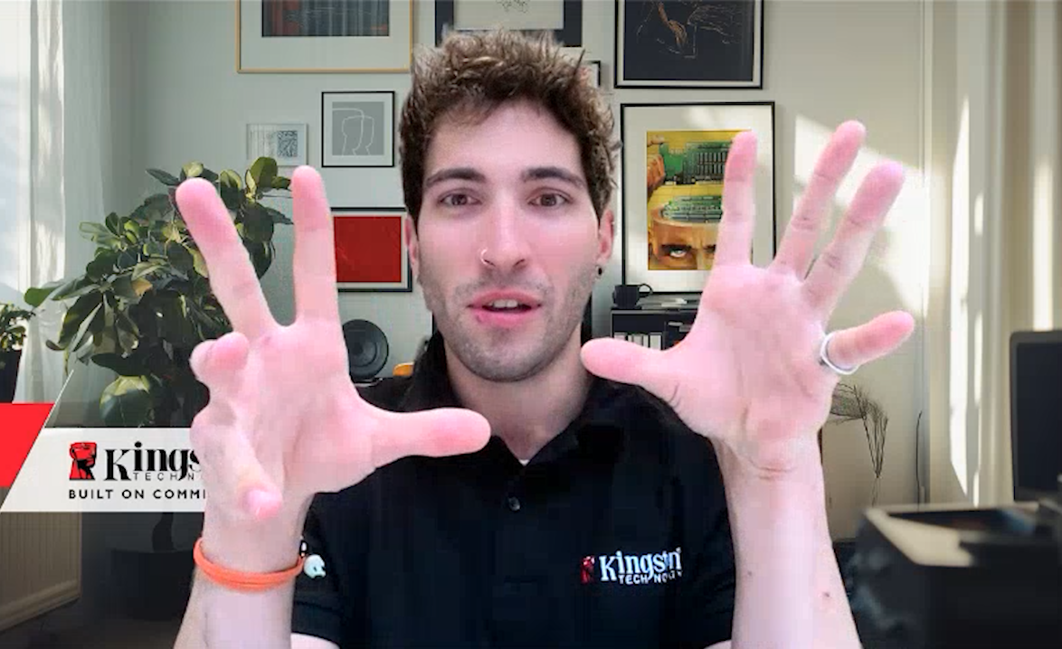 A handsome Italian explaining the security features of a Kingston USB drive
