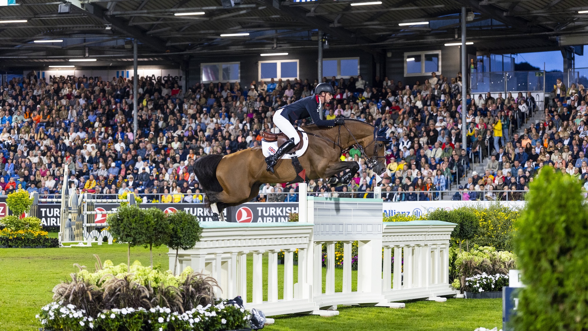 Ben Maher and Point Break clear a wall at the World Championships