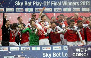 Fleetwood celebrate after winning the 2014 League Two play-off final