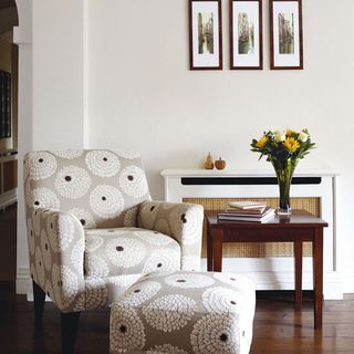 living room with floral print arm chair